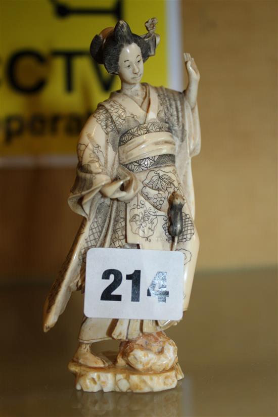 Japanese ivory figure of a lady scared by a rat